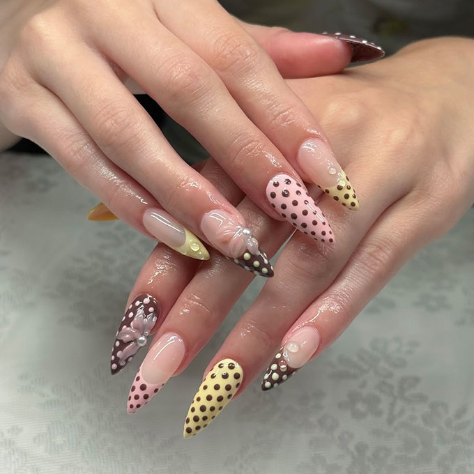 Polka-dotted pastel French tips