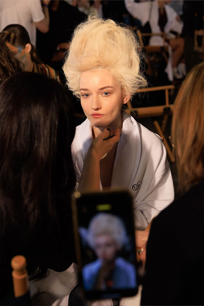 Julia Garner as Marie Antoinette